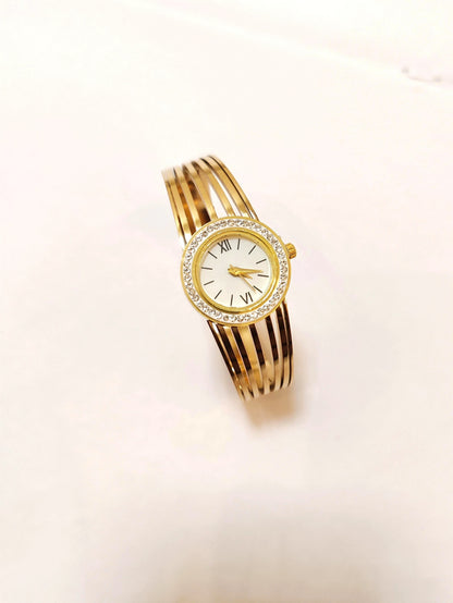 Timeless Elegance: Gold-Toned Multi-Strand Bangle Watch