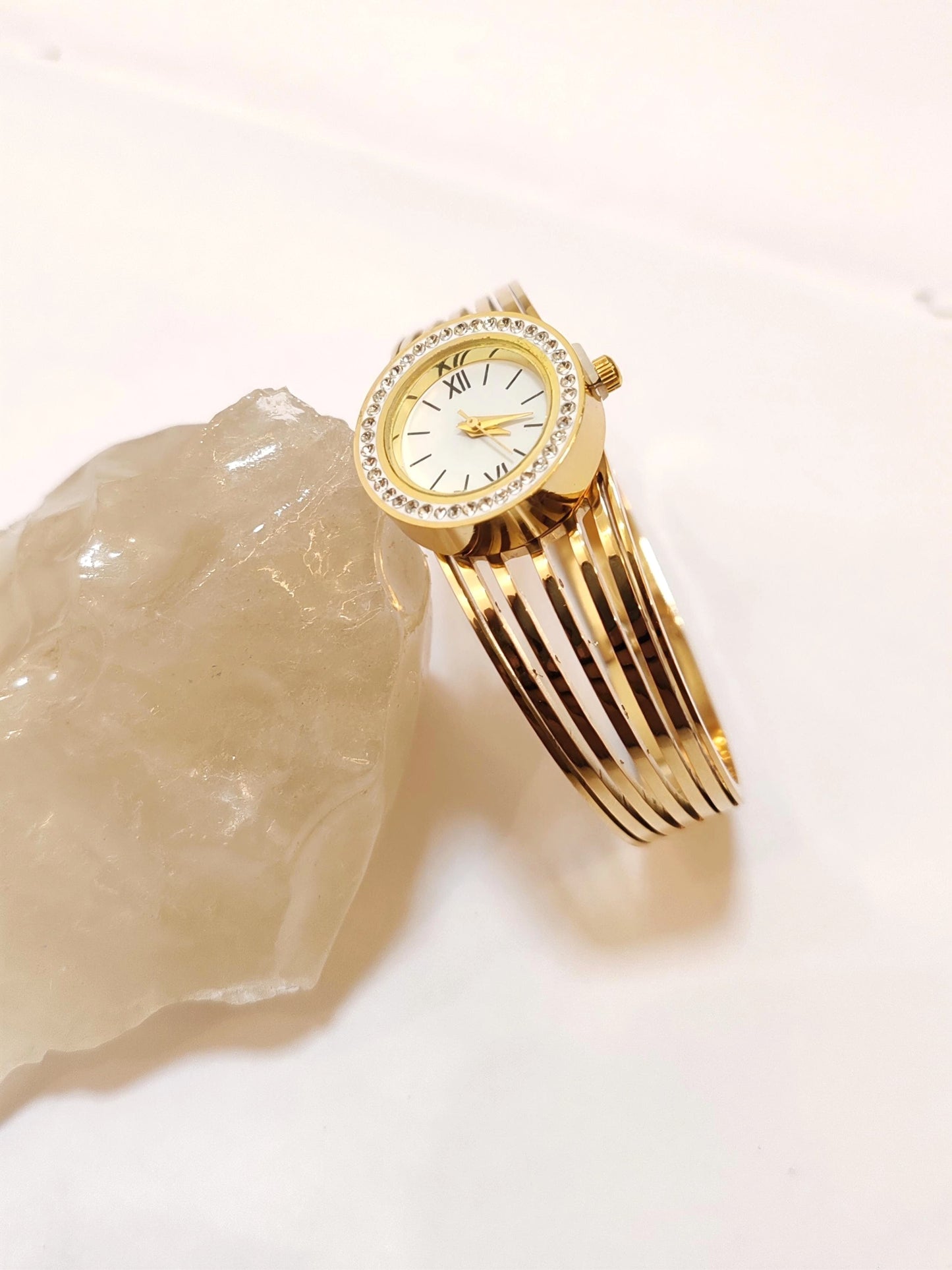 Timeless Elegance: Gold-Toned Multi-Strand Bangle Watch